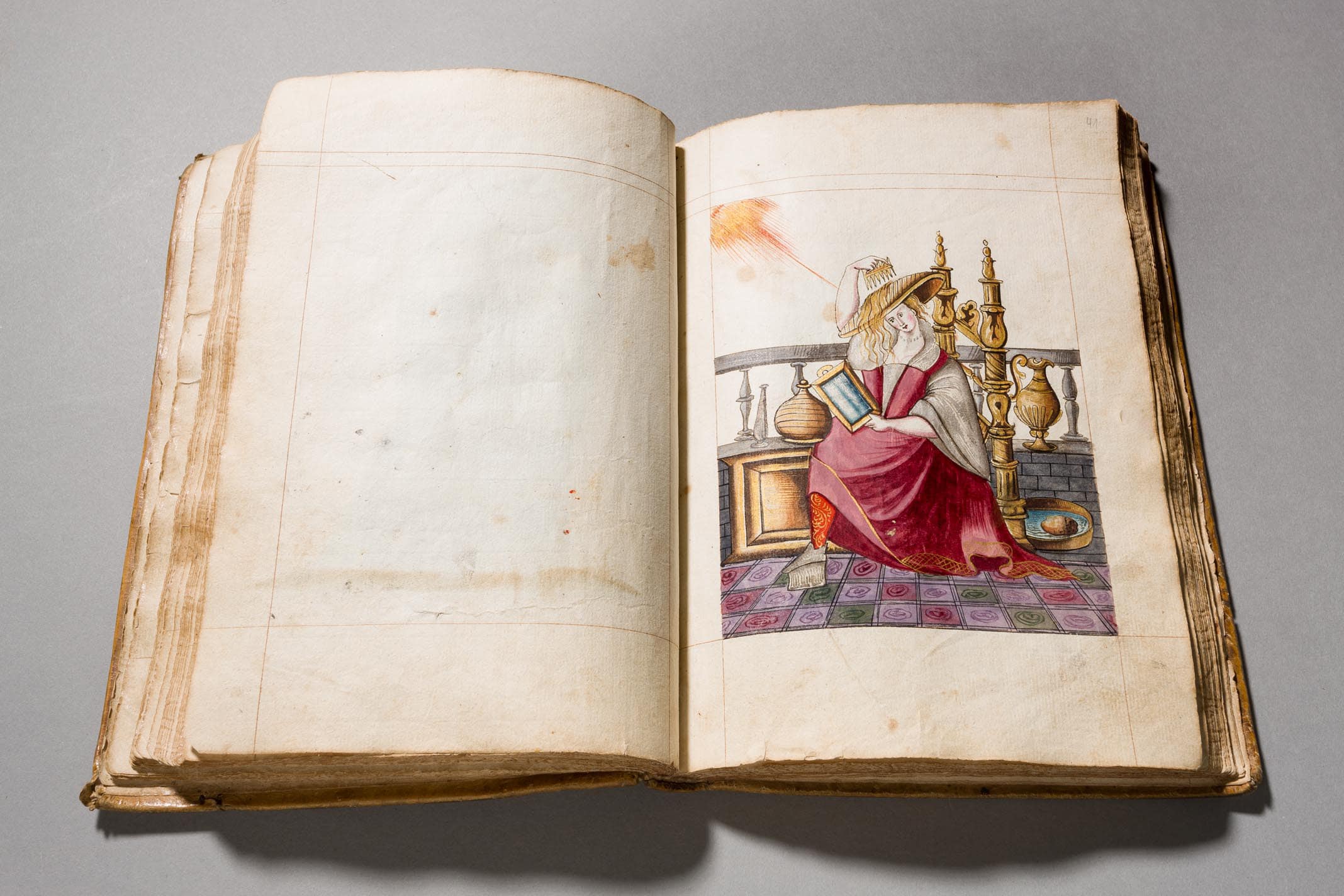 Buch mit 64 Kostümen Italiens, 64 Zeichnungen, 3 Kupferstiche, Italien, um 1581, hier: Venezianerin, die sich an der Sonne die Haare mit Salzwasser blondiert. Foto: © Münchner Stadtmuseum